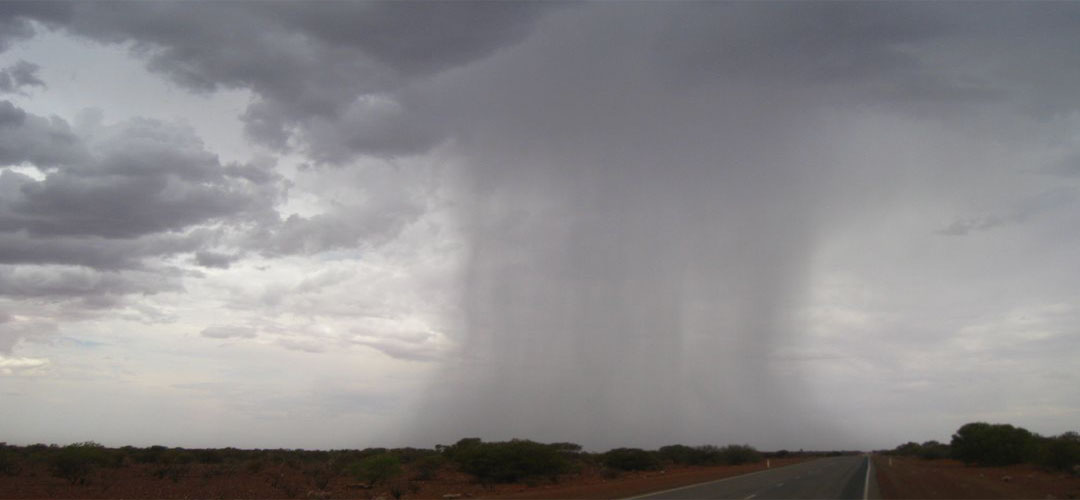 rain on cycle tour, Meekatharra, Great Northern Highway, Western Australia